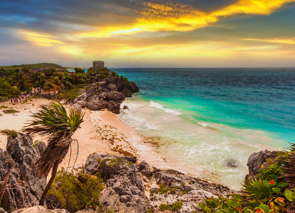 Caribbean beach at the cliff in Tulum at sunset, Mexico