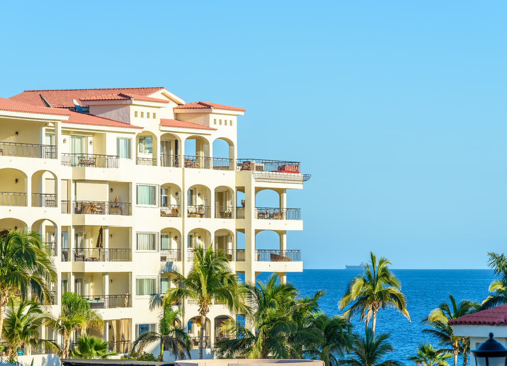 White building with tropical background in Mexico