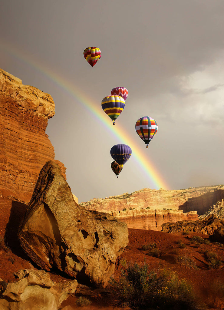Rainbow and brief dramatic sunshine, New Mexico