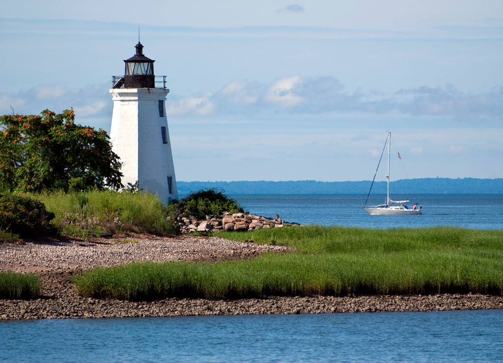 Sailboat Passing by Black Rock Harbor Lighthouse in Connecticut