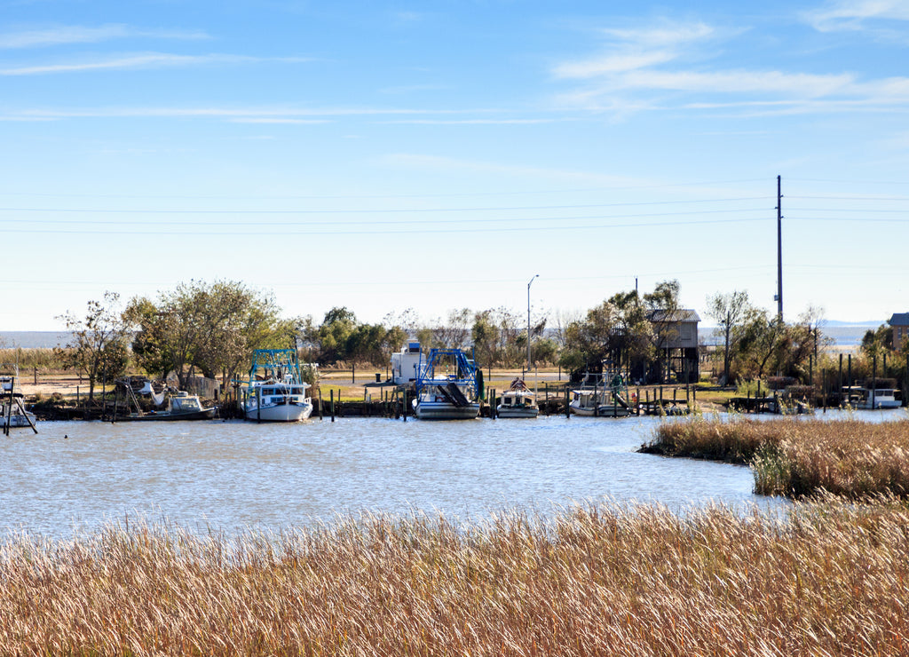Saltwater marsh with boats and small ships in Mobile, Alabama