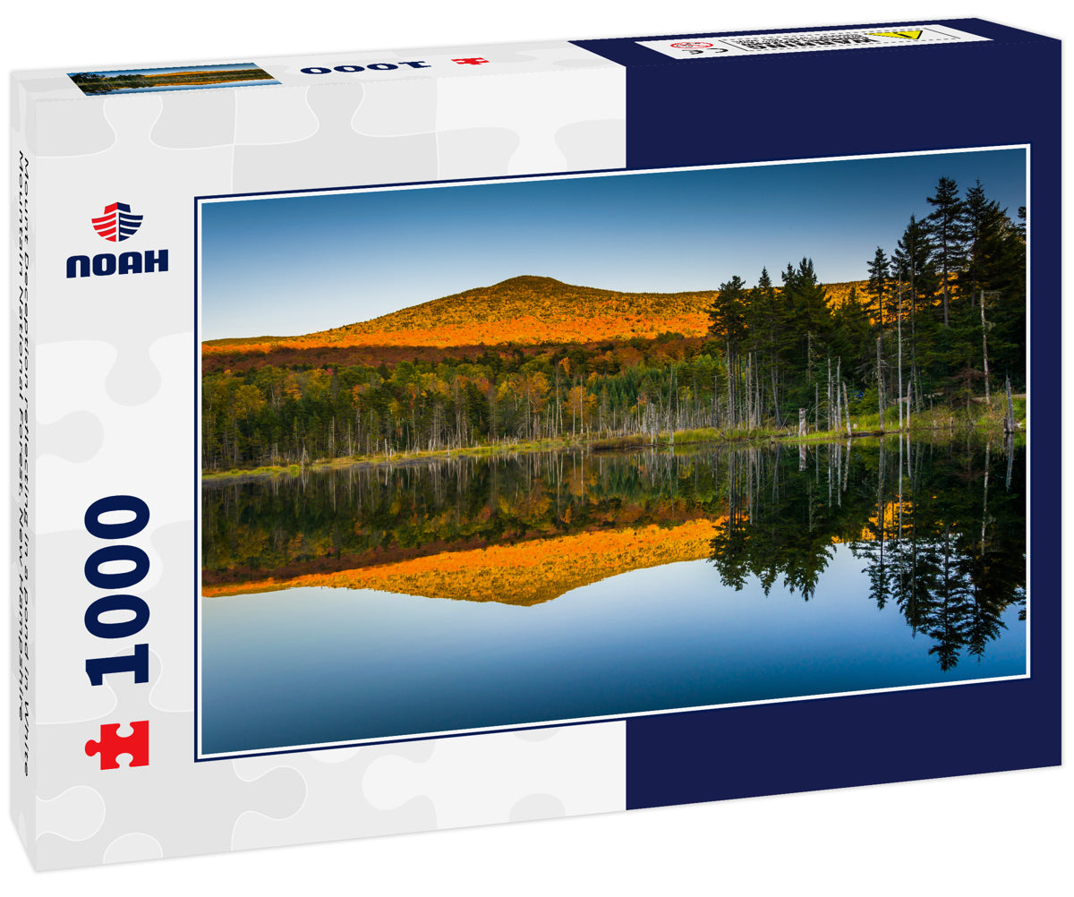 Mount Deception reflecting in a pond in White Mountain National Forest, New Hampshire