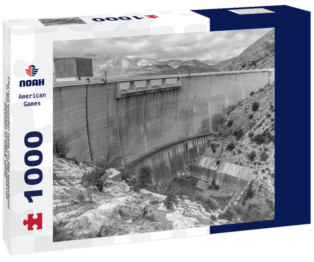 Noah Jigsaw Puzzle Old red wooden halls on the waterfront in the historic center of Hudiskvall, Sweden in black white 1000 pieces