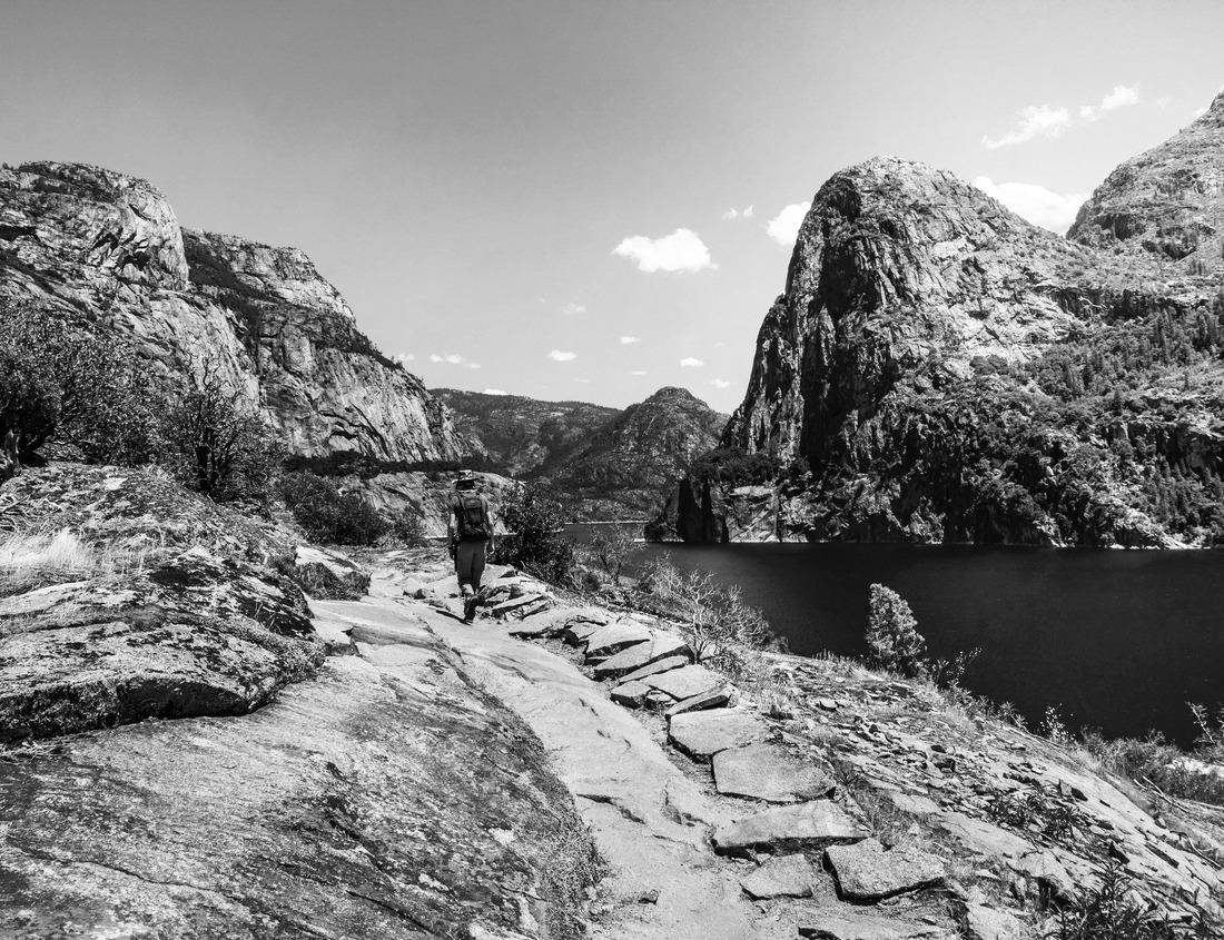 Noah Jigsaw Puzzle Hiking is taking place on the shoreline of Hetch Hetchy Reservoir in Yosemite National Park, California. in black white 1000 pieces