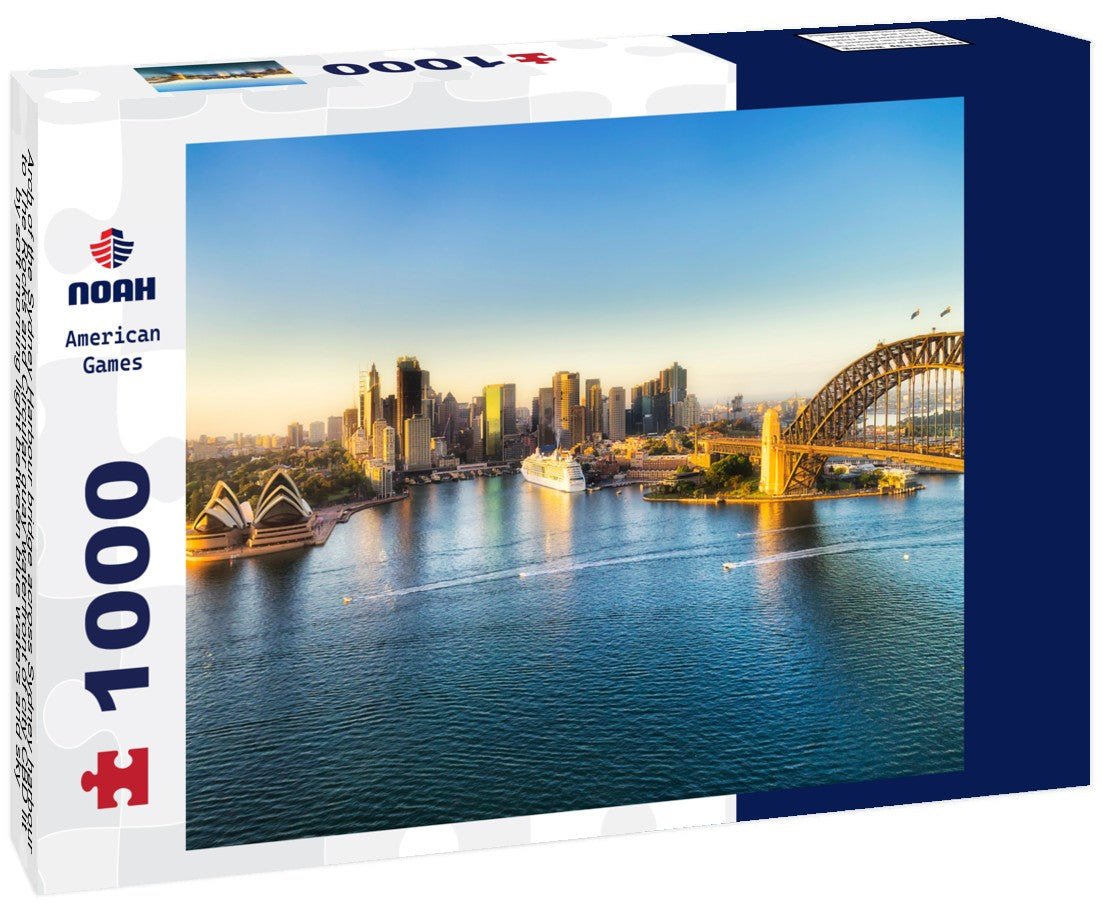 Noah Jigsaw Puzzle Arch of the Sydney Harbour bridge across Sydney harbour to The Rocks and Circular quay waterfront of city CBD lit by soft morning light between blue waters and sky 1000 pieces