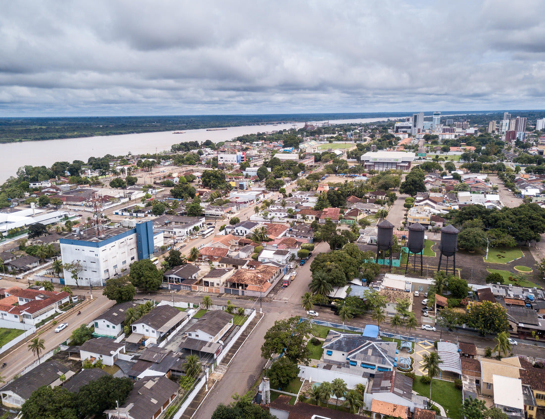 Noah Jigsaw Puzzle Aerial drone view of Porto Velho city center streets with “Praça das tres caixas dagua” square and Madeira river and Amazon rainforest in the background on cloudy winter day. Rondonia state, Brazil 1000 pieces