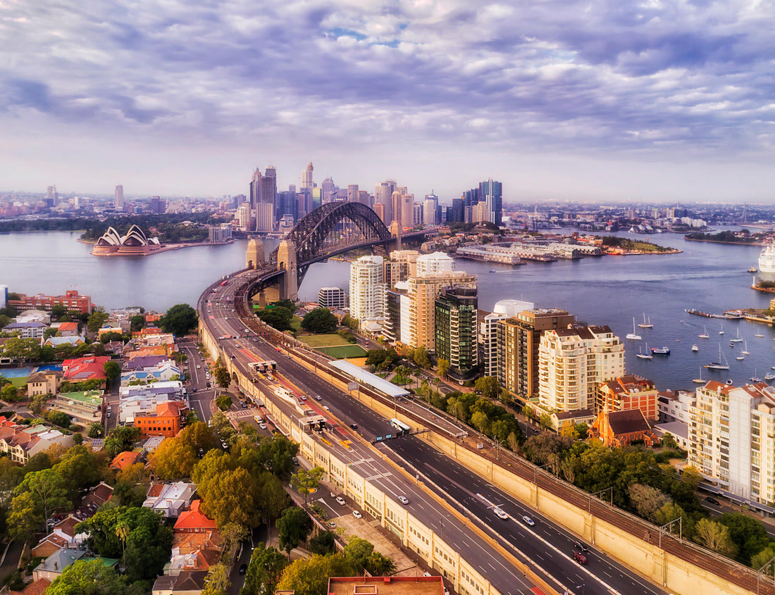 Noah Jigsaw Puzzle Motorway entering the Sydney Harbour bridge to Sydney city CBD in elevated aerial view above roof tops and high-rise towers 1000 pieces