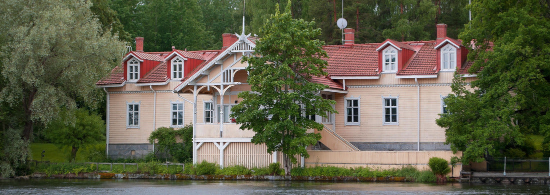 Noah Jigsaw Puzzle Beige-colored house with red tiled roof by the lake, in the evening, near the town of Heinola in Finland Panorama 1000 Pieces