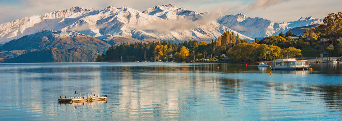 Noah Jigsaw Puzzle Morning snow on the lakeshore of Wanaka, South Island, New Zealand with view of snow mountain, colorful trees in autumn, lake and blue sky Panorama 1000 Pieces