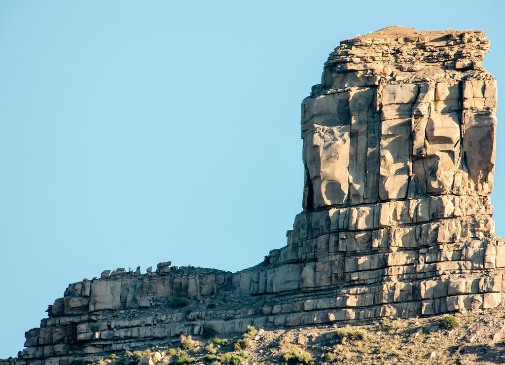 The Chimney Rock Archaeological Area, near Pagosa Springs, Colorado, with Chimney Rock lit in the early morning light