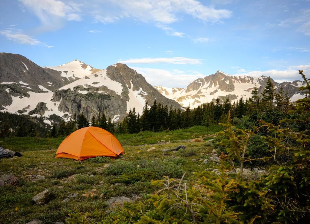Orange Tent in Mountains with Trees, Snow in Indian Peaks Wilderness, Colorado