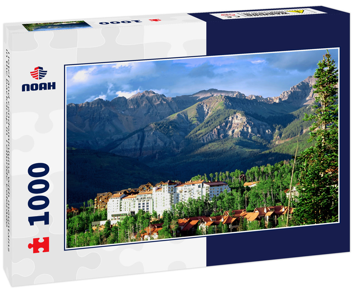 Hotel and condominiums with mountains in the backdrop in Telluride Colorado