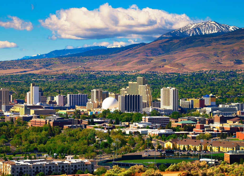Downtown Reno skyline, Nevada, with hotels, casinos and surrounding mountains