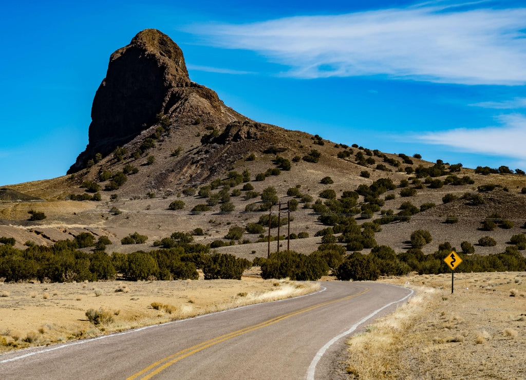 Water Canyon Road leads to a natural rock formation near Cubero in Cibola County, New Mexico, USA