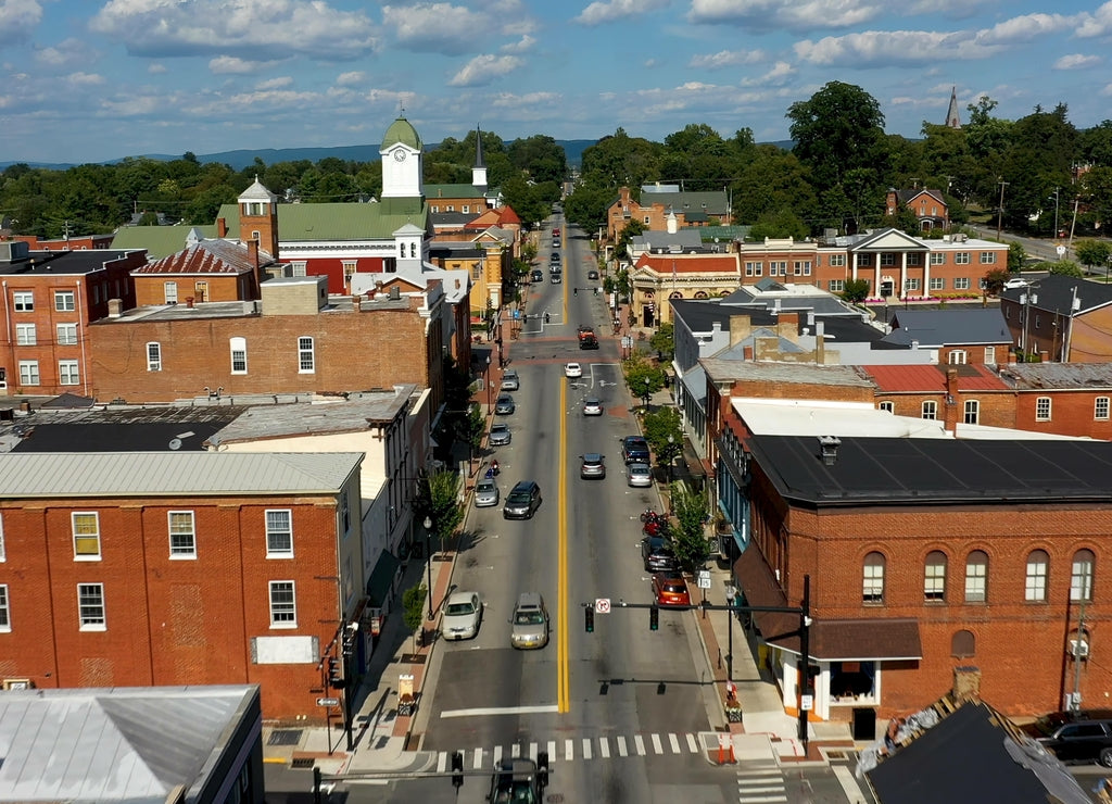 Low aerial view of main street usa, Charles Town, West Virginia, WV on a beautiful sunny day