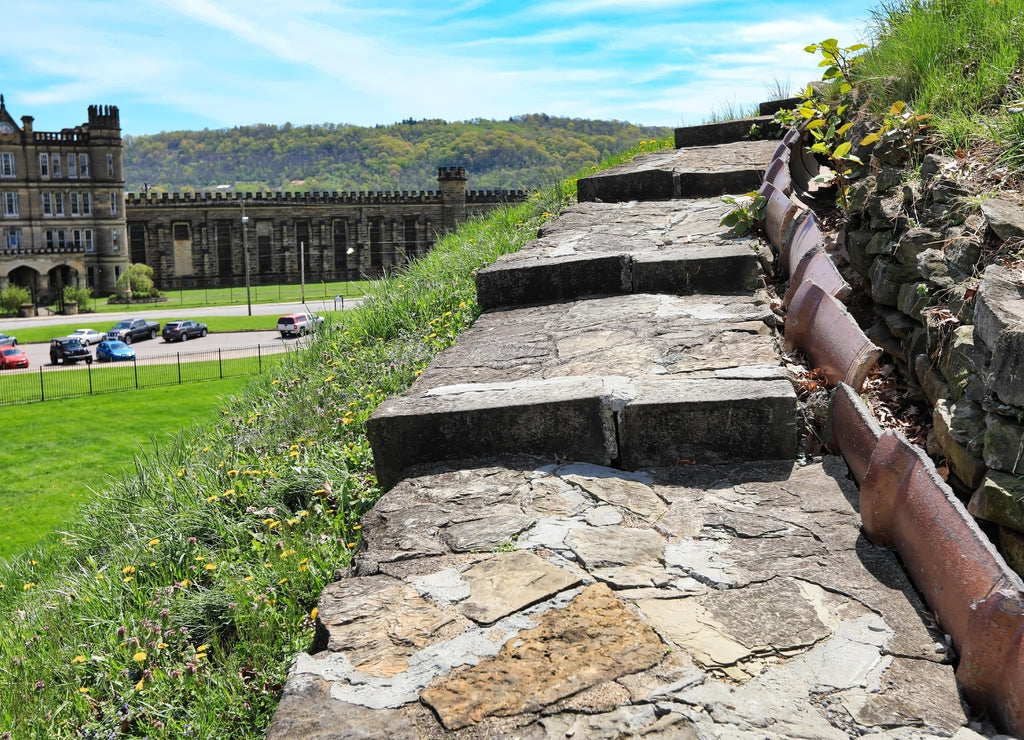 Moundsville, West virginia, just outside of Wheeling, is home to the Grave Creek Mound. This historic landmark burial mound was built by the Arena people
