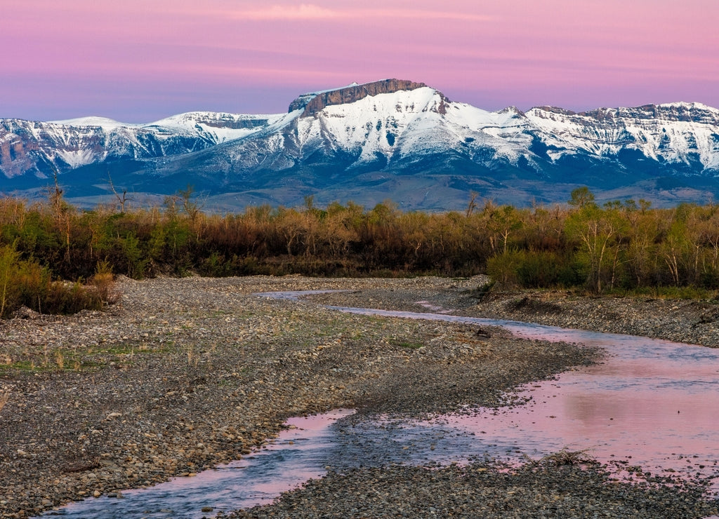 Dawn along the Teton River with Ear Mountain in background near Choteau, Montana, USA