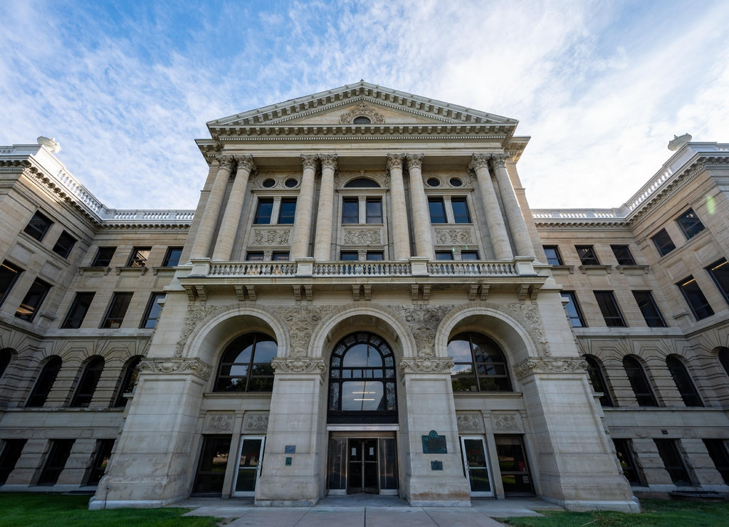Wide angle close up photo of Lucas county courthouse in downtown Toledo Ohio
