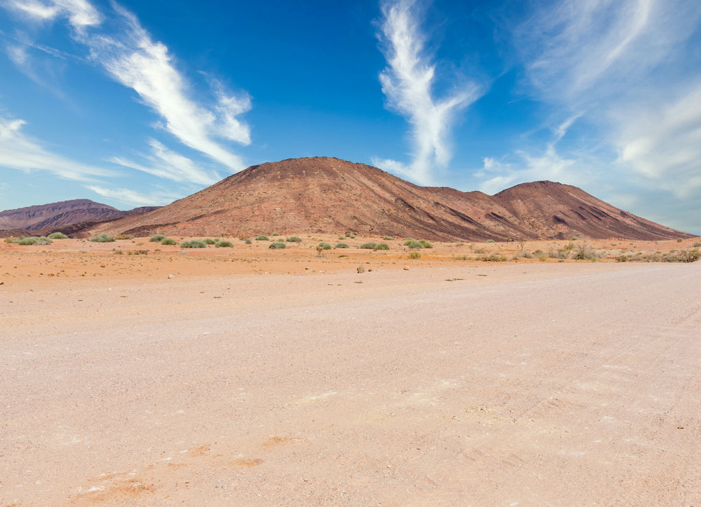 Gravel road and beautiful landscape in Namibia