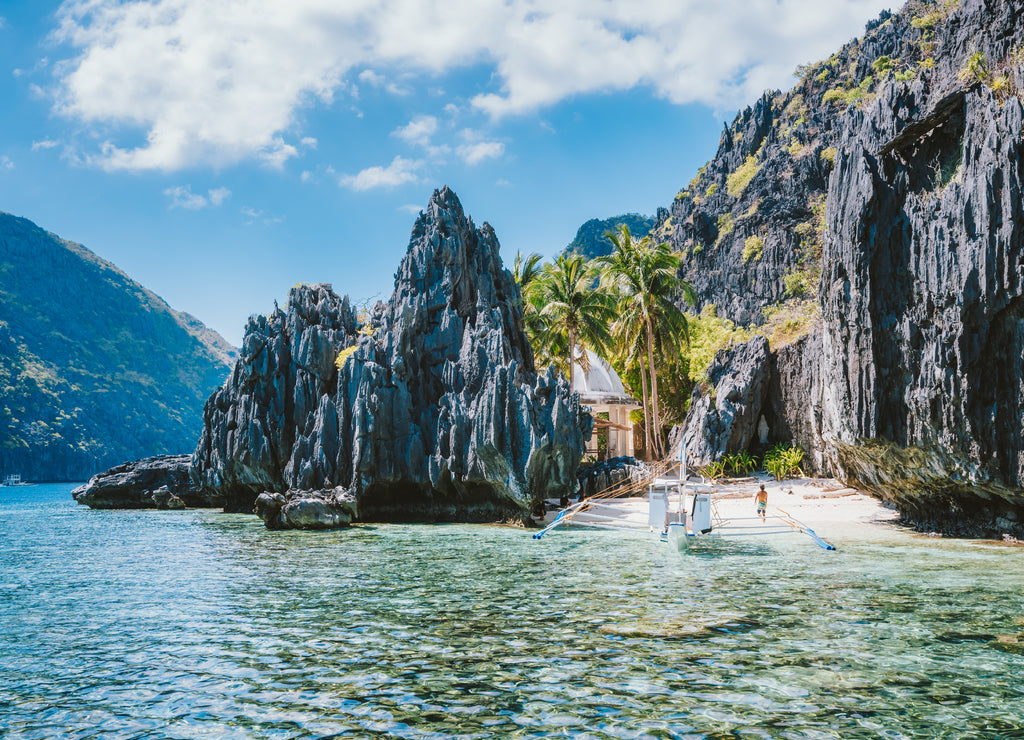 El Nido Palawan Philippines Asia. Banca boat at a small beach near the Matinloc Shrine