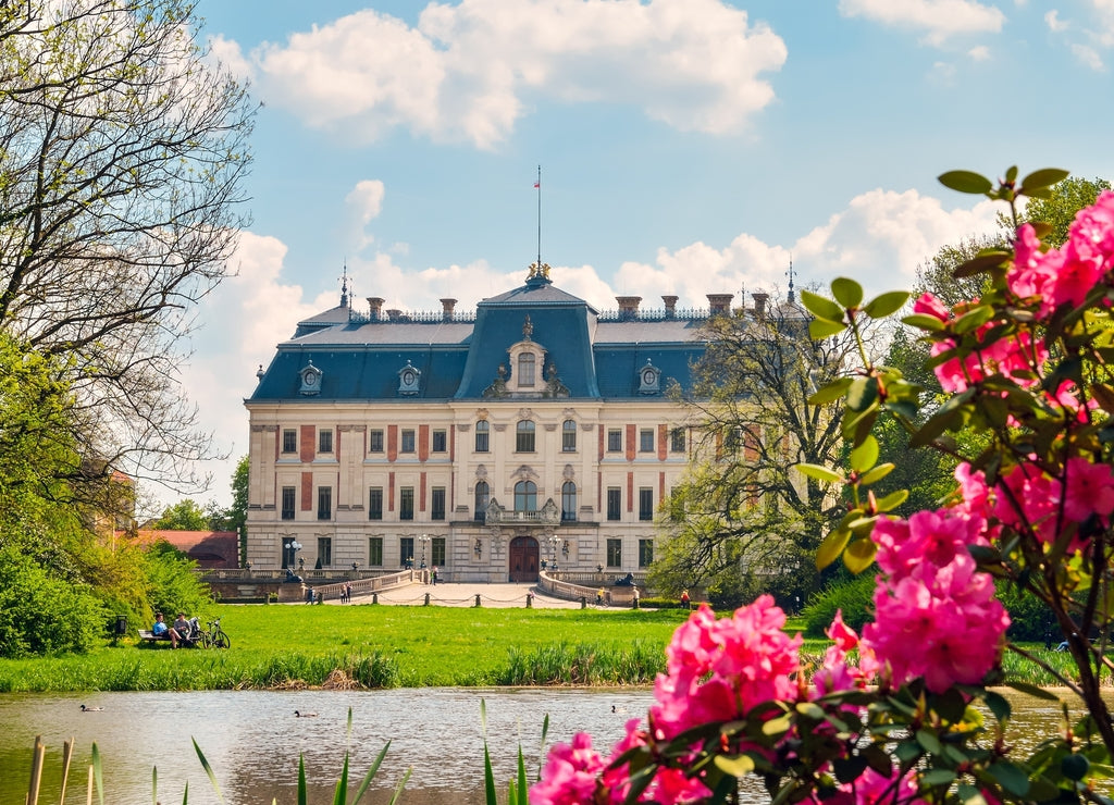 Beautiful historic castle in colorful spring scenery. Neo baroque castle in a park in Pszczyna in Poland