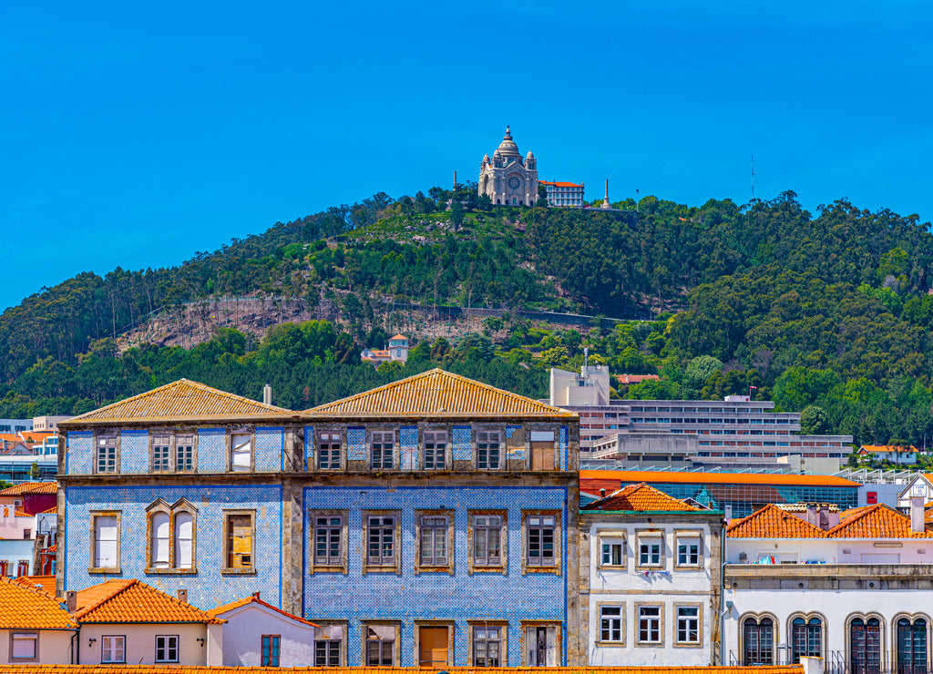 Colorful facades of houses on Lima riverside in Viana do Castelo in Portugal