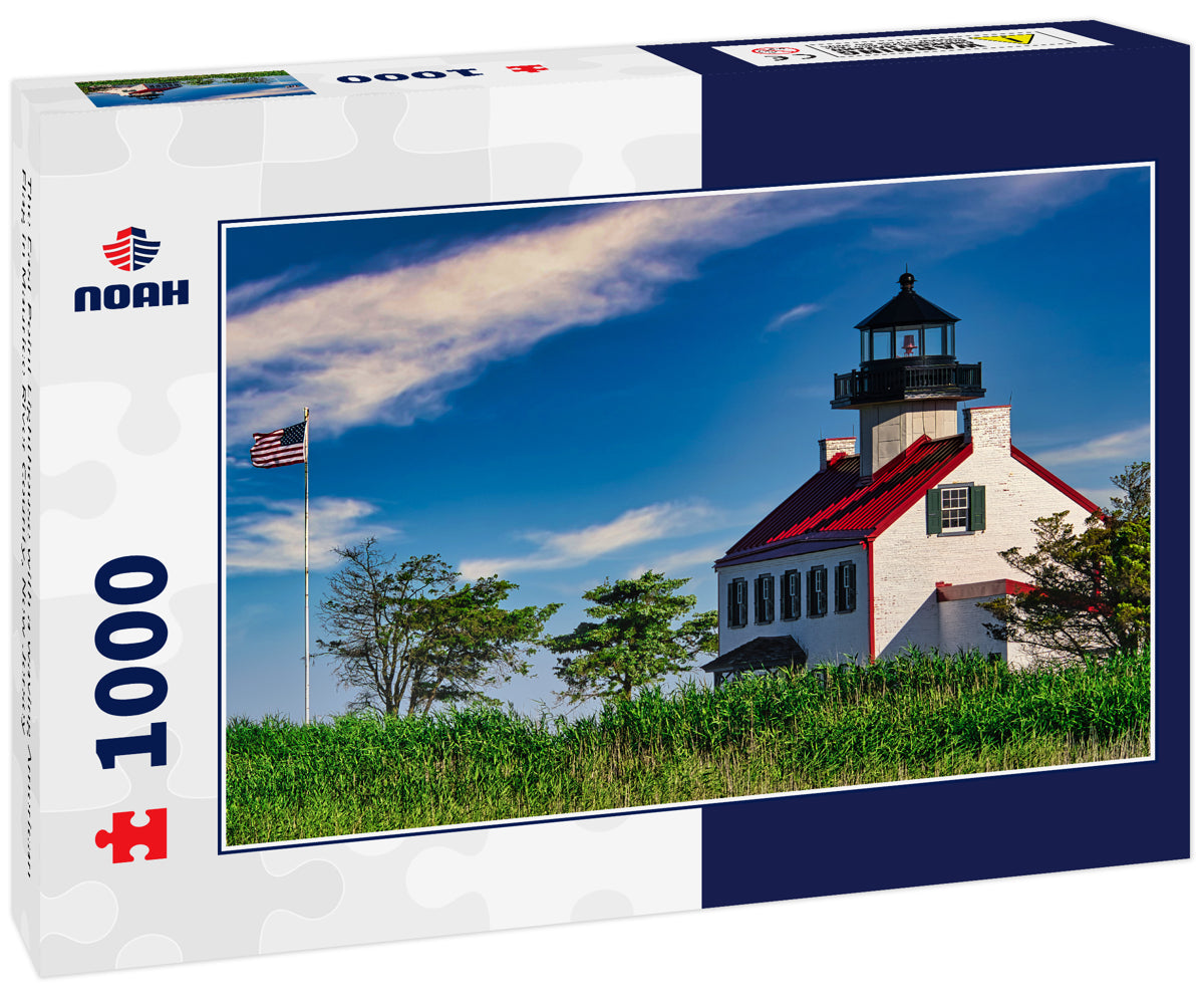 The East Point Lighthouse with a waving American Flag in Maurice River County, New Jersey