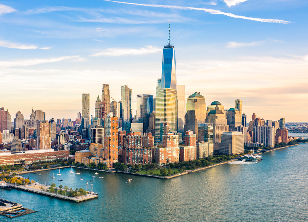 Aerial view with Lower Manhattan skyline at sunset viewed from above Hudson River