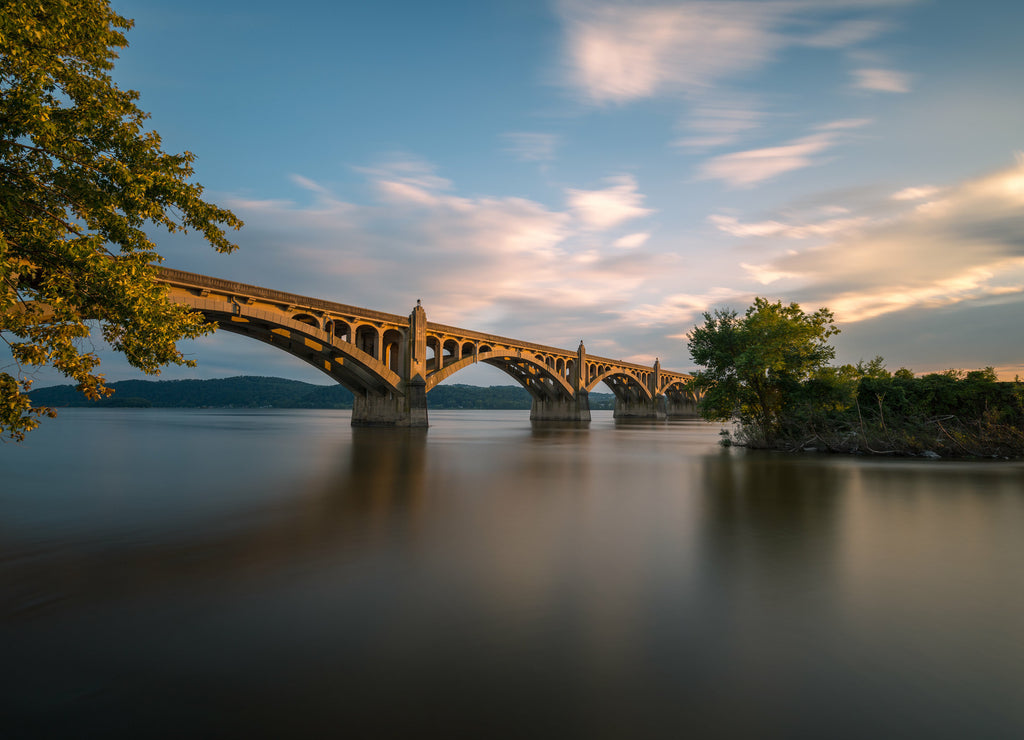 The Columbia–Wrightsville Bridge, officially the Veterans Memorial Bridge, spans the Susquehanna River between Columbia and Wrightsville, Pennsylvania, USA