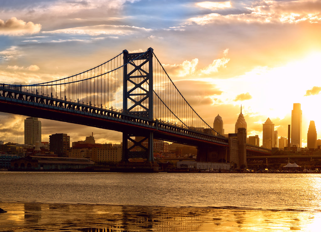 Philadelphia skyline and Ben Franklin Bridge at sunset, US