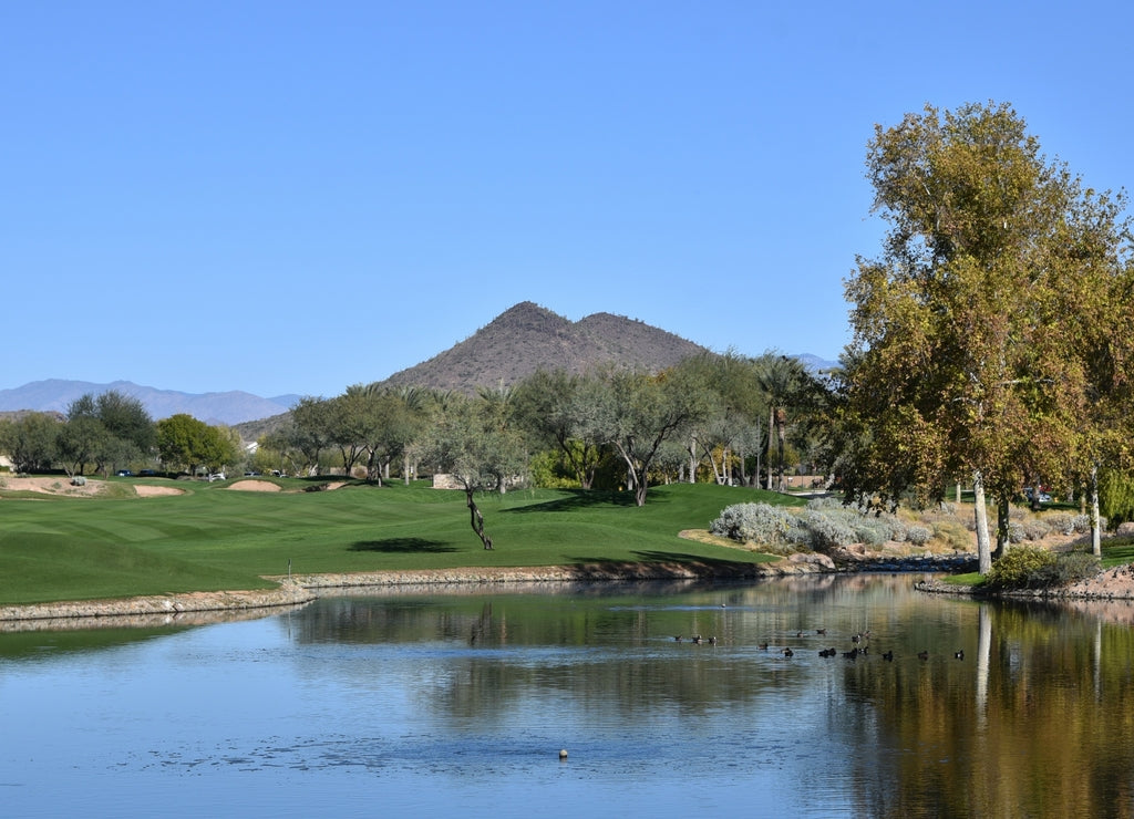 Scenic view of a golf course in Peoria Arizona with mountain in the background