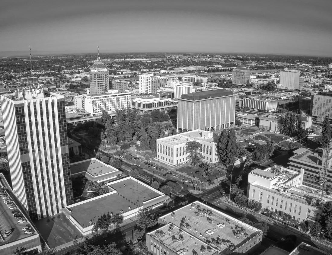Noah Jigsaw Puzzle Air drum shot. Traditional Maasai village at sunset near Arusha, Tanzania in black white 1000 pieces