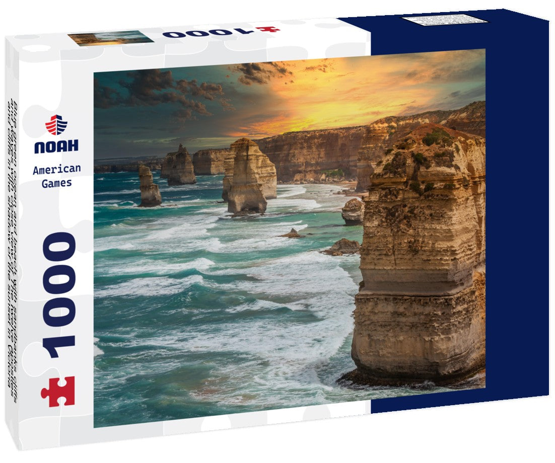 Noah Jigsaw Puzzle Blue green ocean and beach with sandbanks cliffs and waves with close view of The twelve apostles and cliffs in the shadow of the sunset in Victoria, Australia against a orange cloudy sky 1000 pieces