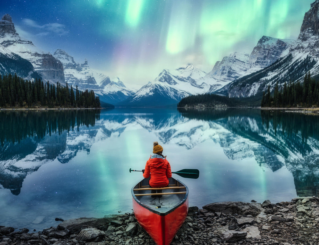 Noah Jigsaw Puzzle Beautiful aurora borealis on Spirit Island with female traveler on canoe in Jasper National Park, AB, Canada 1000 pieces