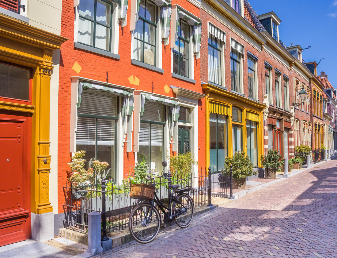 Noah Jigsaw Puzzle Bicycle in front of colorful houses in the historic city of Leeuwarden, Netherlands 1000 pieces