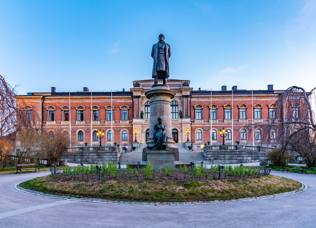 Sunset view of Statue of Erik Gustaf Geijer in front of the university of Uppsala in Sweden