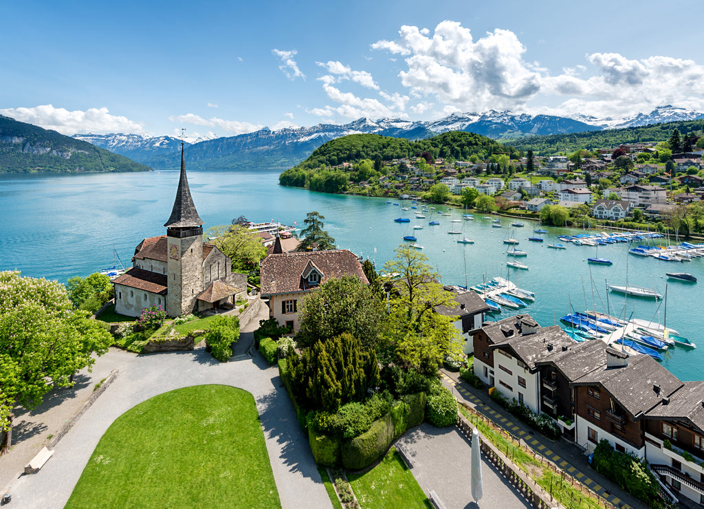Spiez castle with cruise ship on lake Thun in Bern, Switzerland