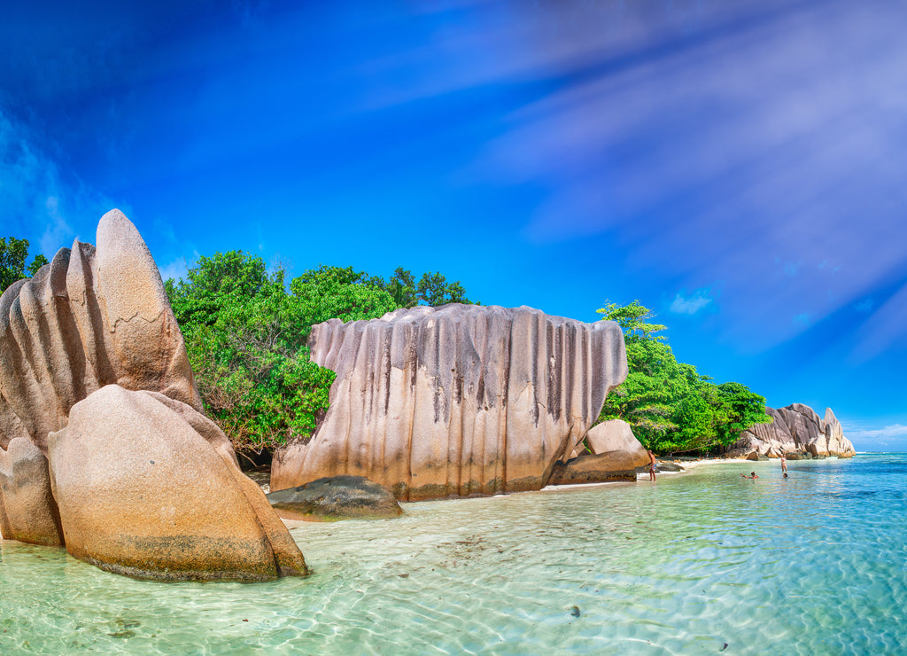 Amazing panoramic view of Anse Source Argent from the sea. La Digue, Seychelles