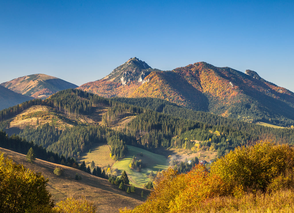 Landscape with mountains at sunrise. Mala Fatra National Park, near the village of Terchova in Slovakia, Europe