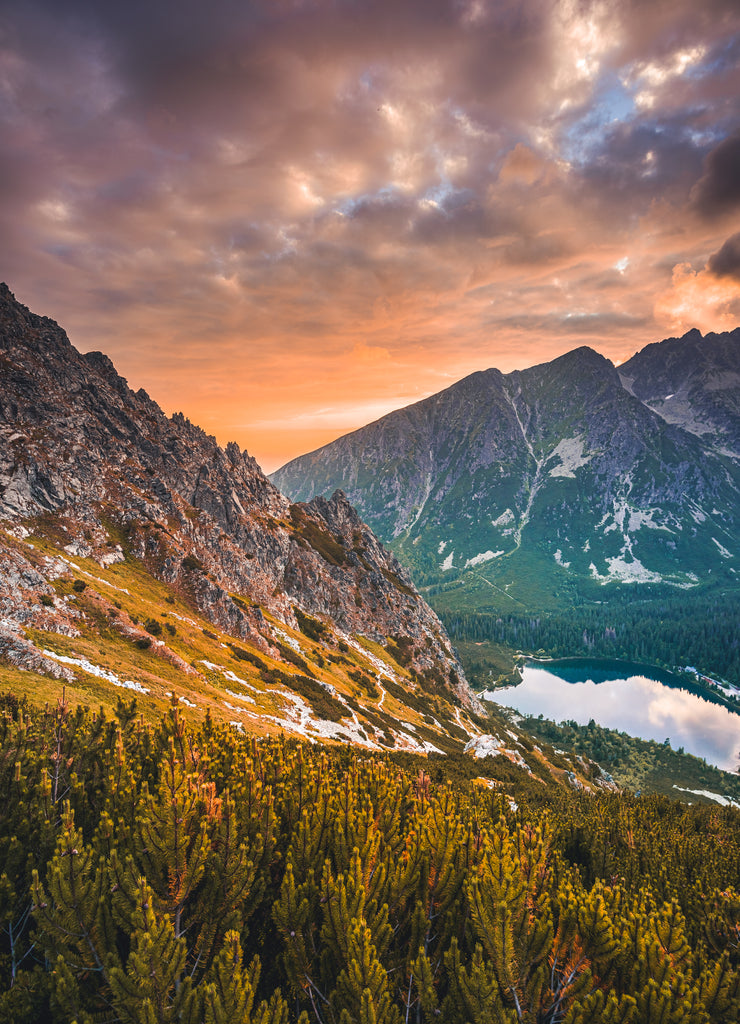 Sunset panorama in High Tatras mountains national park. Mountain popradske lake in Slovakia