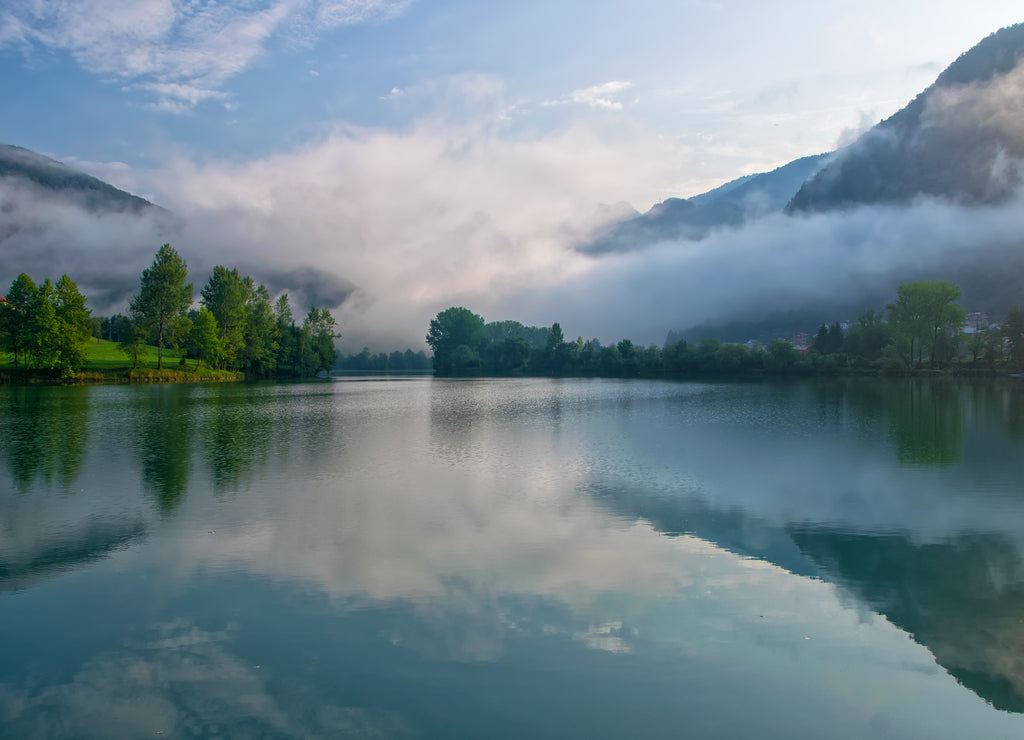 Amazing view of reservoir on Soca river near Most na Soci, Slovenia at foggy morning
