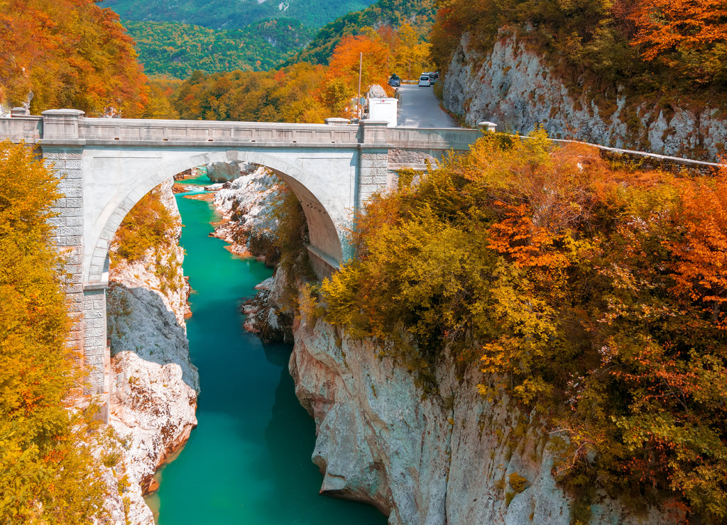 Autumn scenery of Soca river and Napoleon's bridge near Kobarid, Slovenia