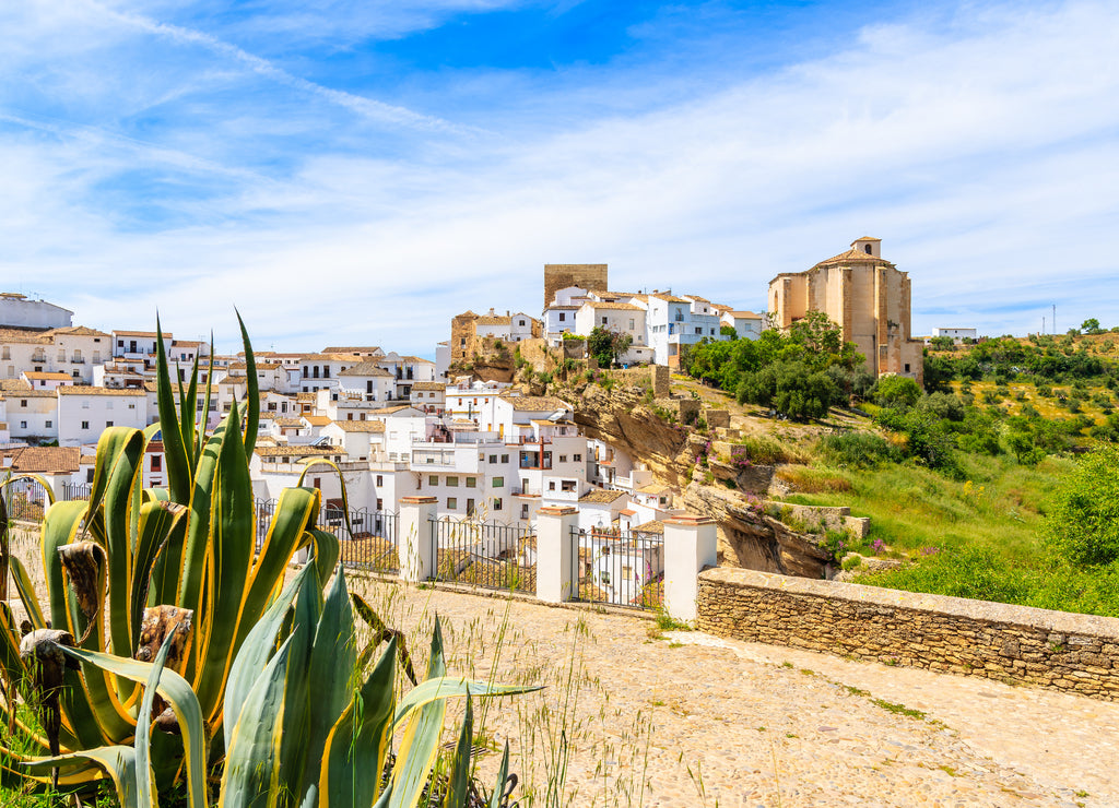View of beautiful white village with church on hill, Sentinel de las Bodegas, Andalusia, Spain