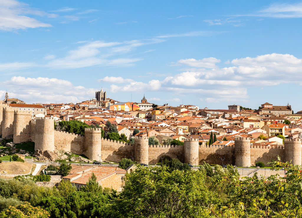 Panoramic view of the historic city of Avila from the Mirador of Cuatro Postes, Spain, with its famous medieval town walls