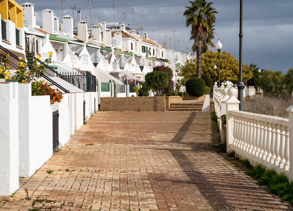 Isla Cristina, Spain - Colorful white beach houses along the shoreline