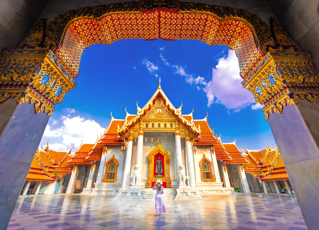 Asian woman visit the beauty of Wat Benchamabophit, Bangkok Thailand