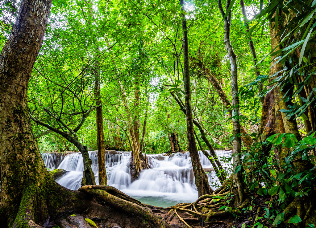 Waterfall and blue emerald water color in Huay Mae Khamin national park. Huay Mae Khamin, Beautiful nature rock waterfall steps in tropical rainforest at Kanchanaburi province, Thailand