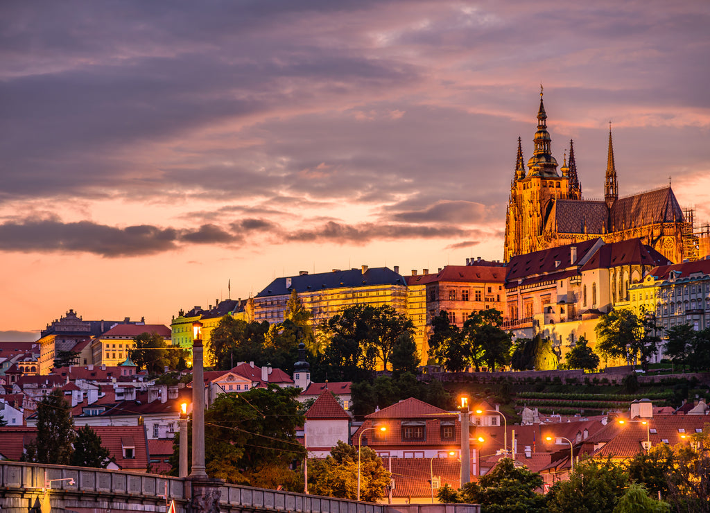 Cityscape of Prague with the famous castle during sunset