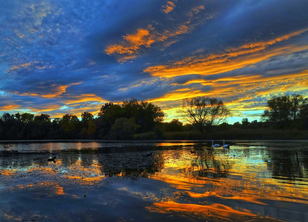 Beautiful autumn sunset at a lake. Prague, Czech Republic