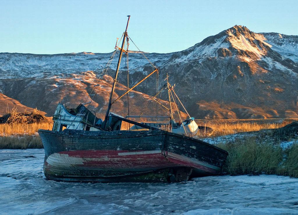 Wrecked ships on the frozen shore of Kodiak Island, Alaska